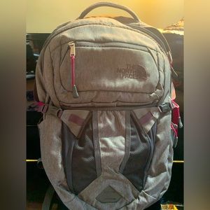 Grey NorthFace backpack with pink accents